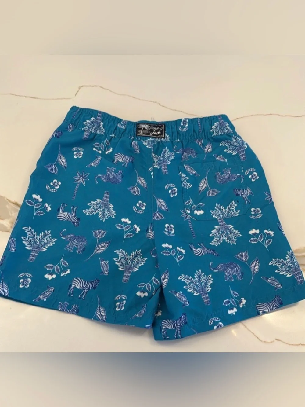 Janie and Jack Teal World Love Swim Trunks with Animal Print